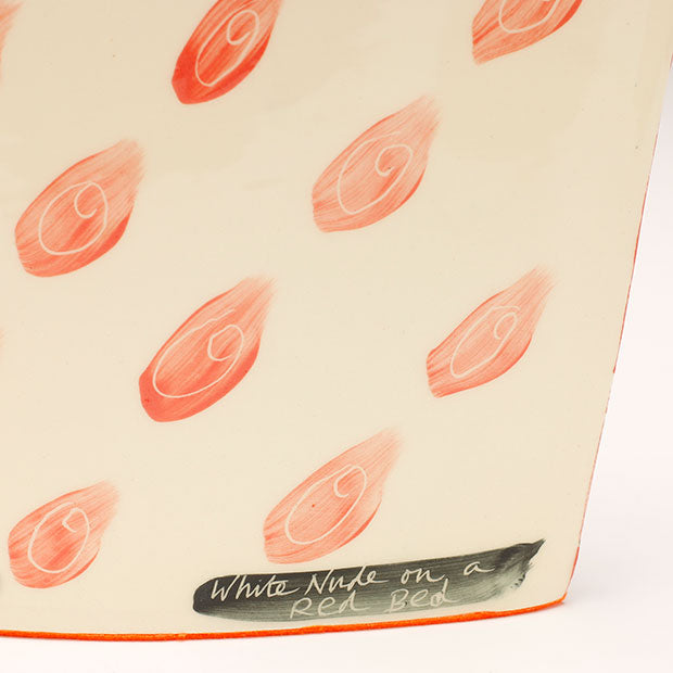 White Nude on a Red Bed